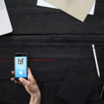 Person doing contactless payment from smartphone