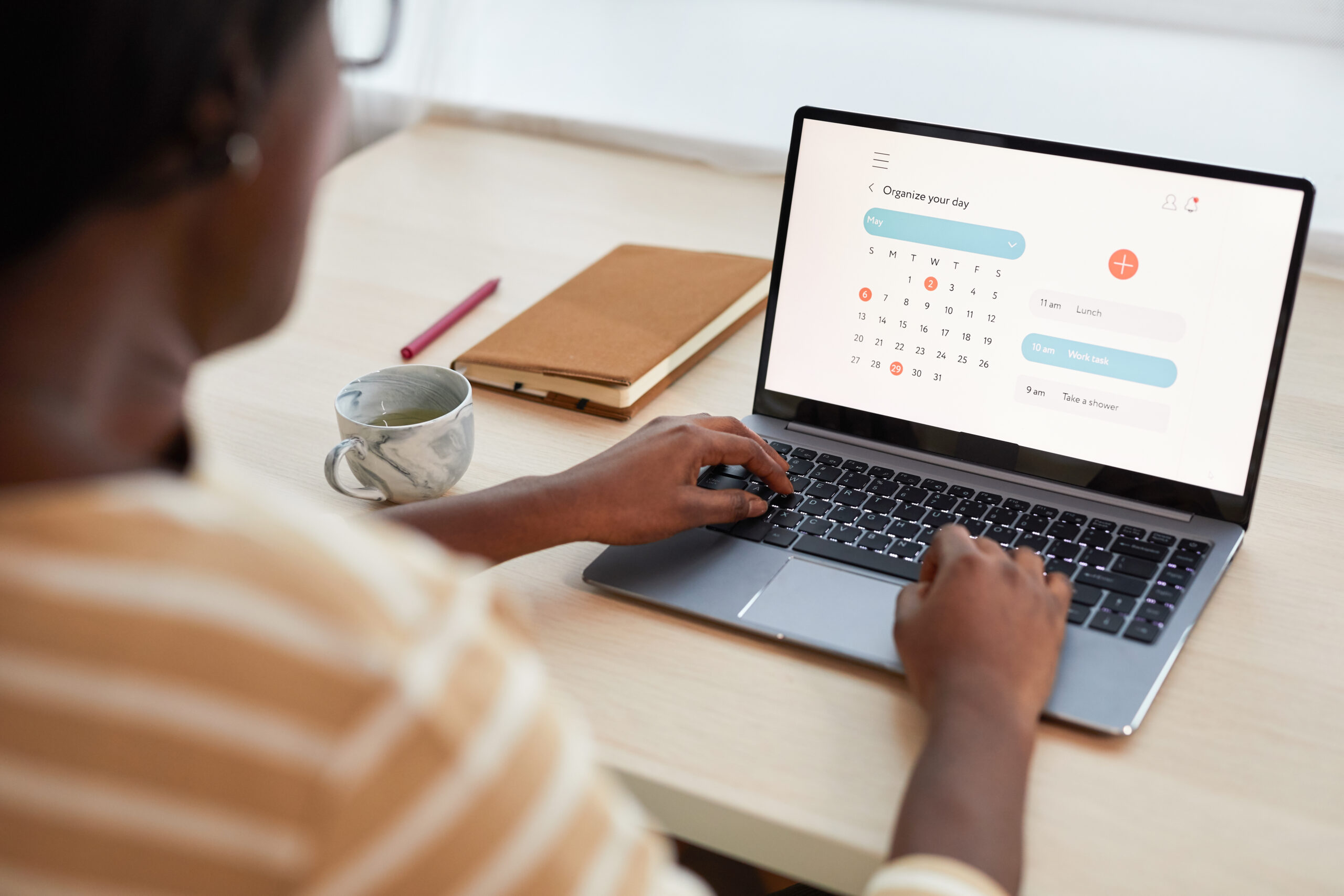 Young African-American Woman Using Time Managing App