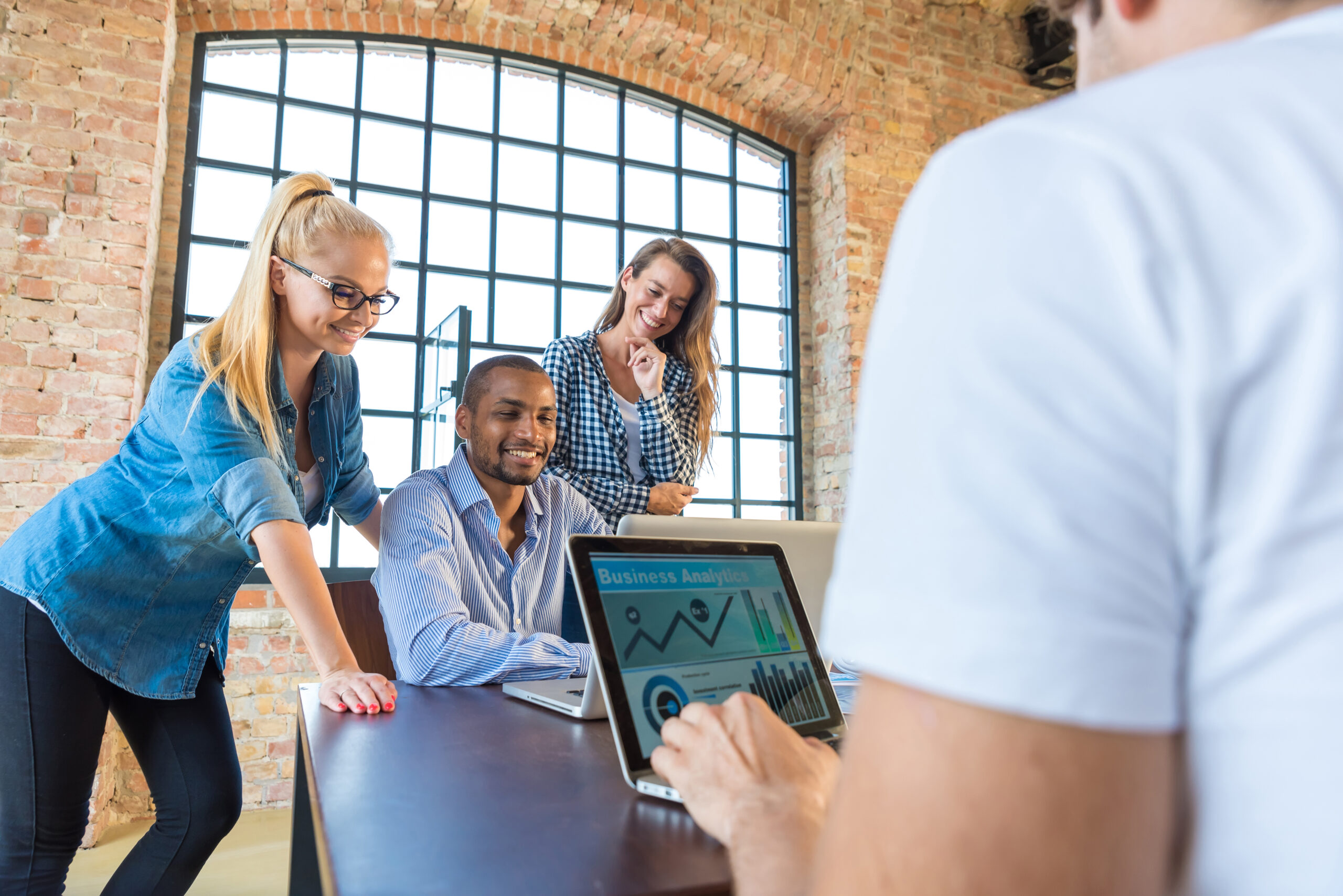 Young business people in office preparing foundation of a start-up company